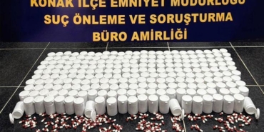 izmirde-450-bin-uyusturucu-hap-1-kilo-660-gram-kokain-ele-gecirildi-fLjXn8Q9.jpg