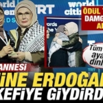 odul-torenine-damga-vuran-anlar-sehit-annesi-emine-erdogana-kefiye-giydirdi-R97ED4sh.jpg